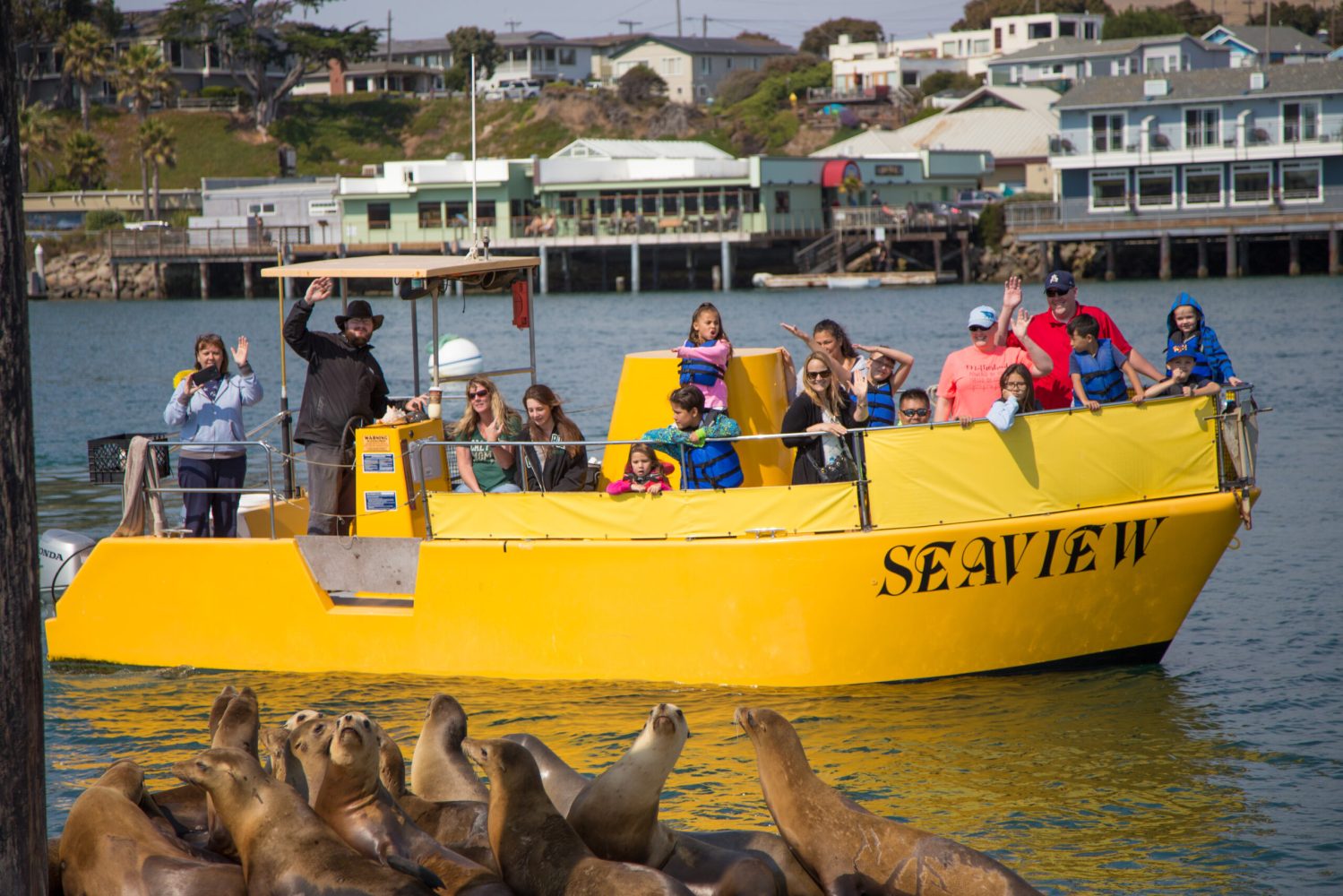 a group of people on a boat in the water