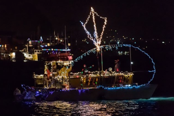 a boat that is lit up at night